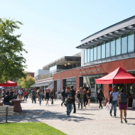 students in front of bookstore