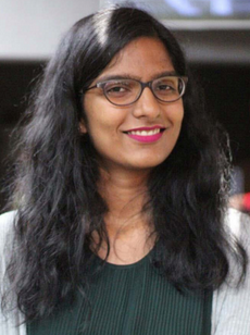 South Asian woman smiling