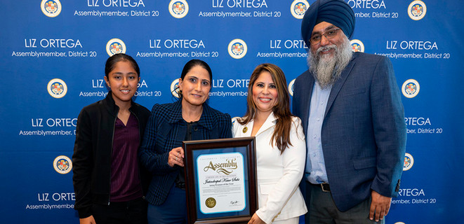 Jatinderpal Sahi and family with Assemblymember Liz Ortega