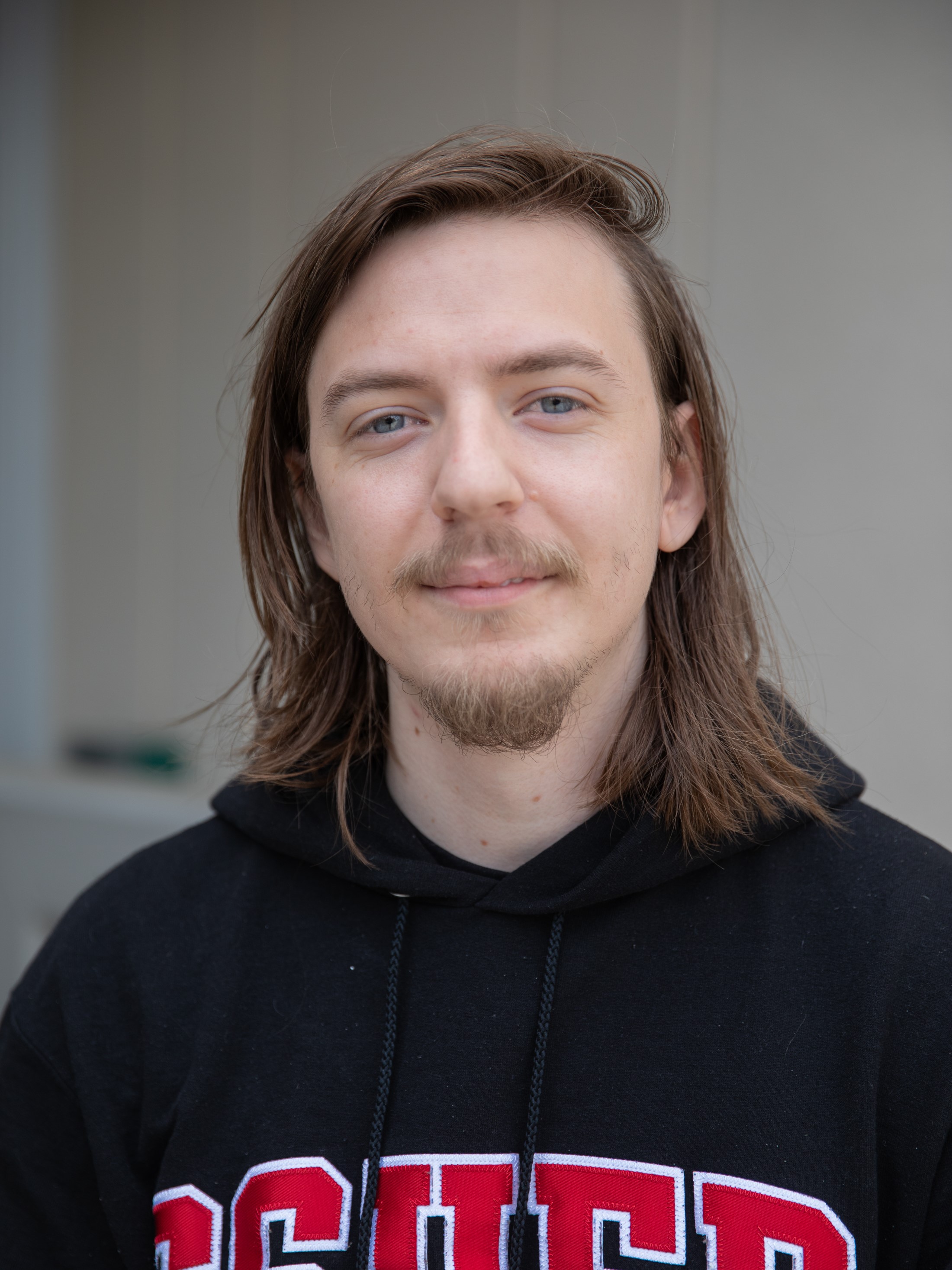 Headshot of Rider Schwenk, Writing Tutoring Lead Employee